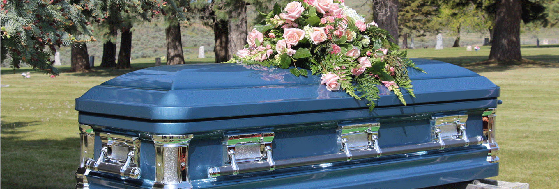 Blue Casket With Beautiful Flowers